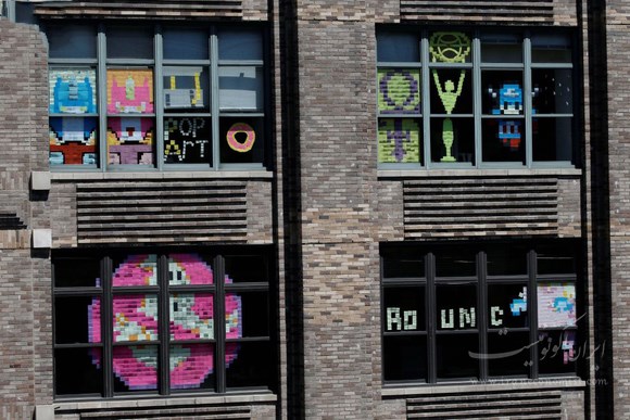 طرح های خلاقانه برروی شیشه های یک شرکت در منهتن+ تصاویر
