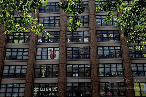 طرح های خلاقانه برروی شیشه های یک شرکت در منهتن+ تصاویر