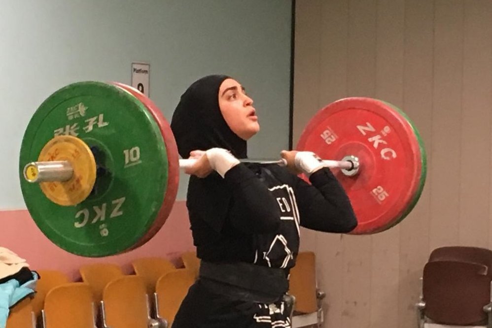 دیوار چین دروازه ورود زنان وزنه بردار ایرانی به المپیک