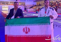 مدال نقره جوجیتسو قهرمانی جهان بر گردن رستمیان