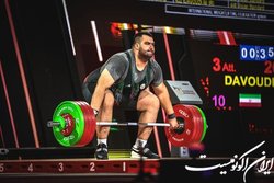 زمان رقابت جذاب غول گرجی و علی داودی در وزنه‌برداری قهرمانی جهان